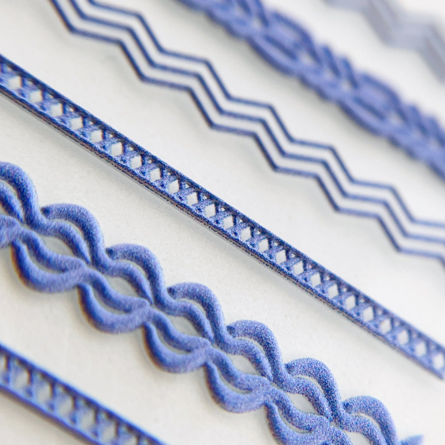 Close-Up of Textured Trim Nail Stickers in Blue - Detailed View of Raised Texture Nail Stickers with Fabric Trim-Inspired Design.