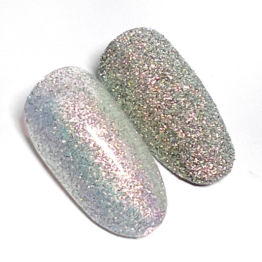 Decorated nail tips on white background.