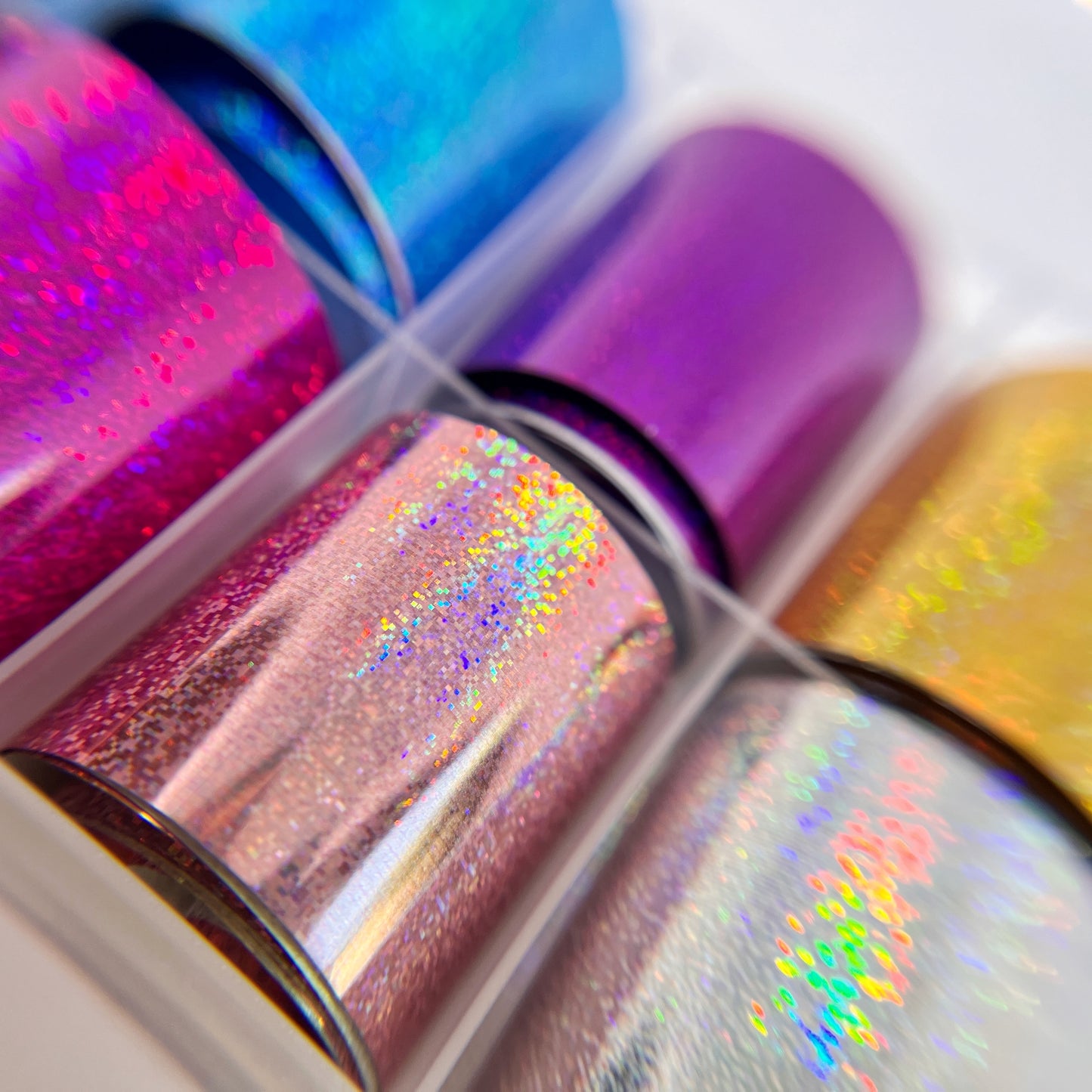 Close-Up of Holo Pixel Foil Set - Detailed View of 10 Holographic Printed Metallic Foils in Vibrant Colors.