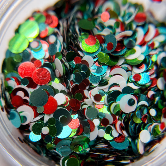 Glitter mix in clear jar.