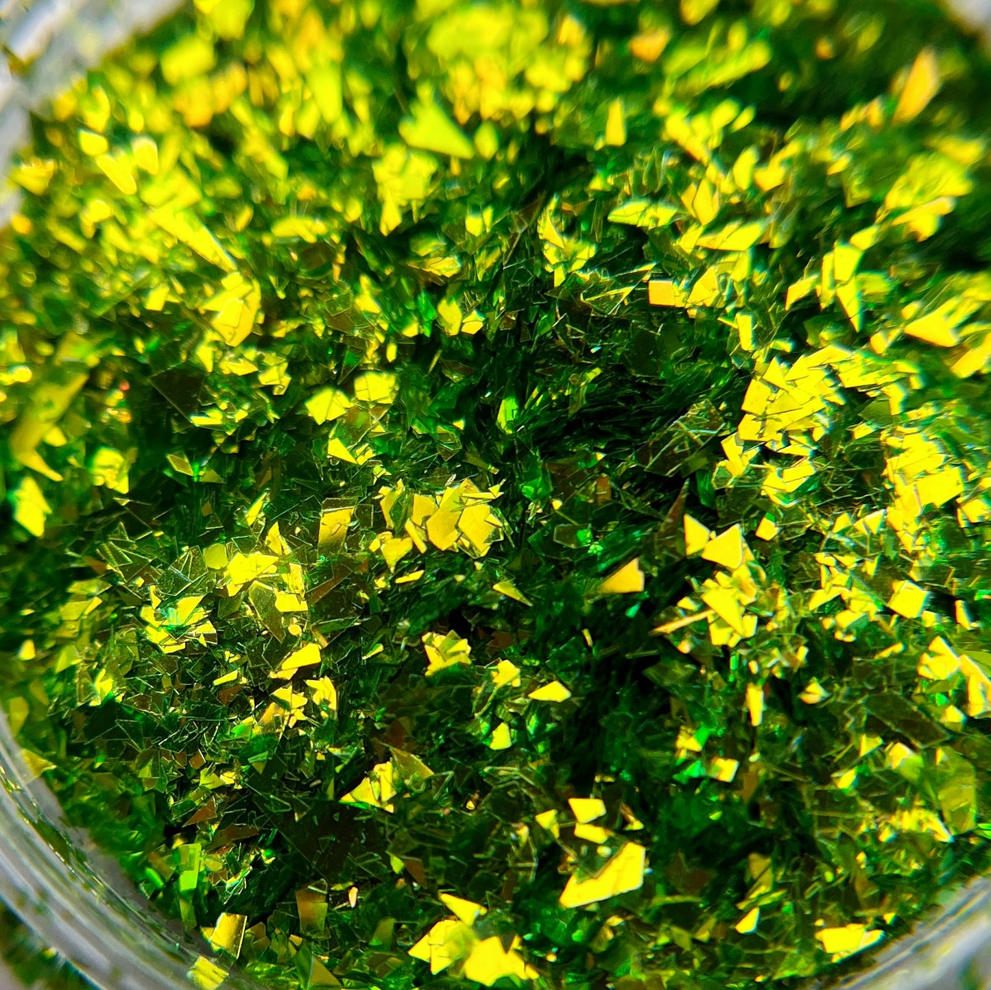 Detail view of lime mylar fleck glitter.