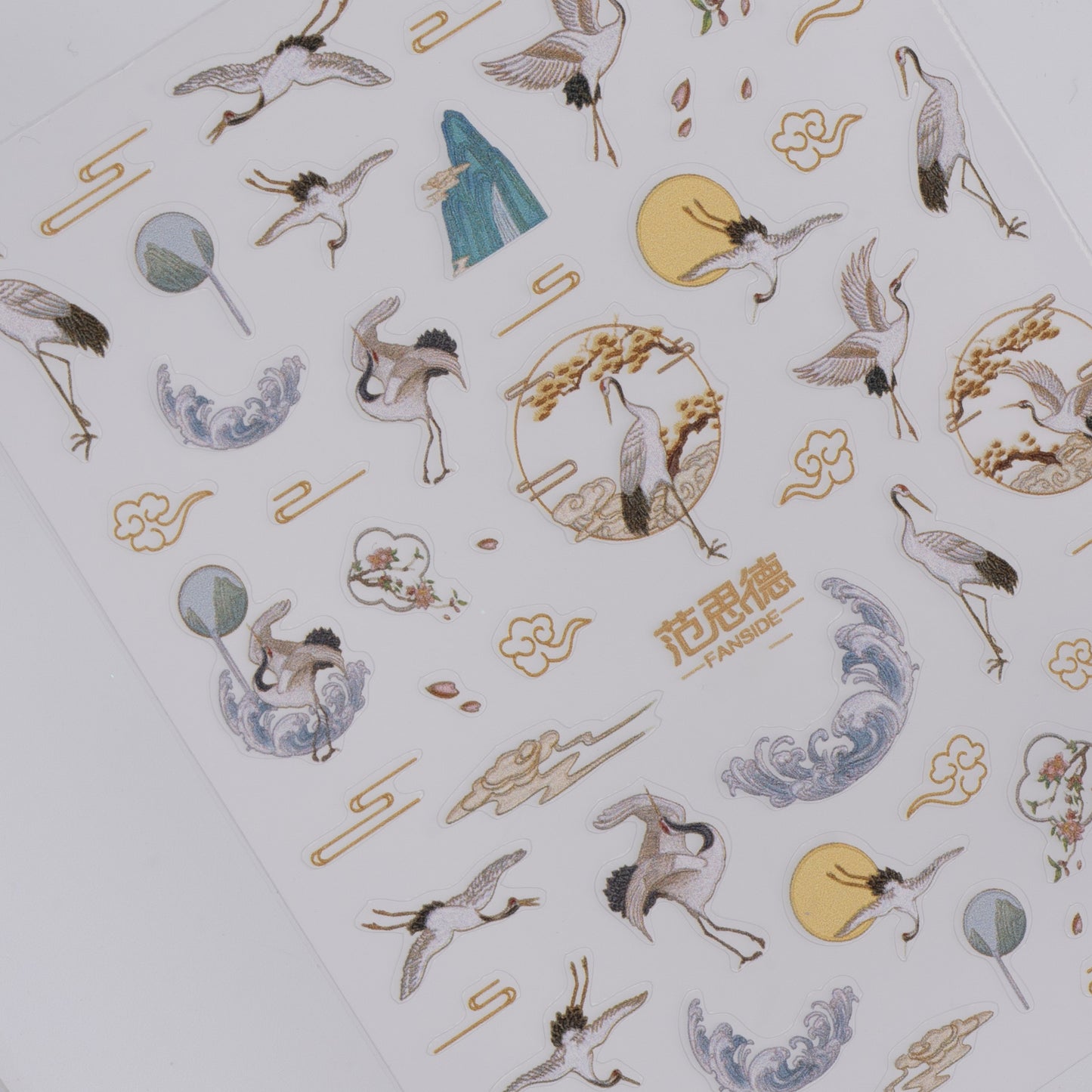 Sheet of decorative stickers with crane designs and Chinese characters on a white background