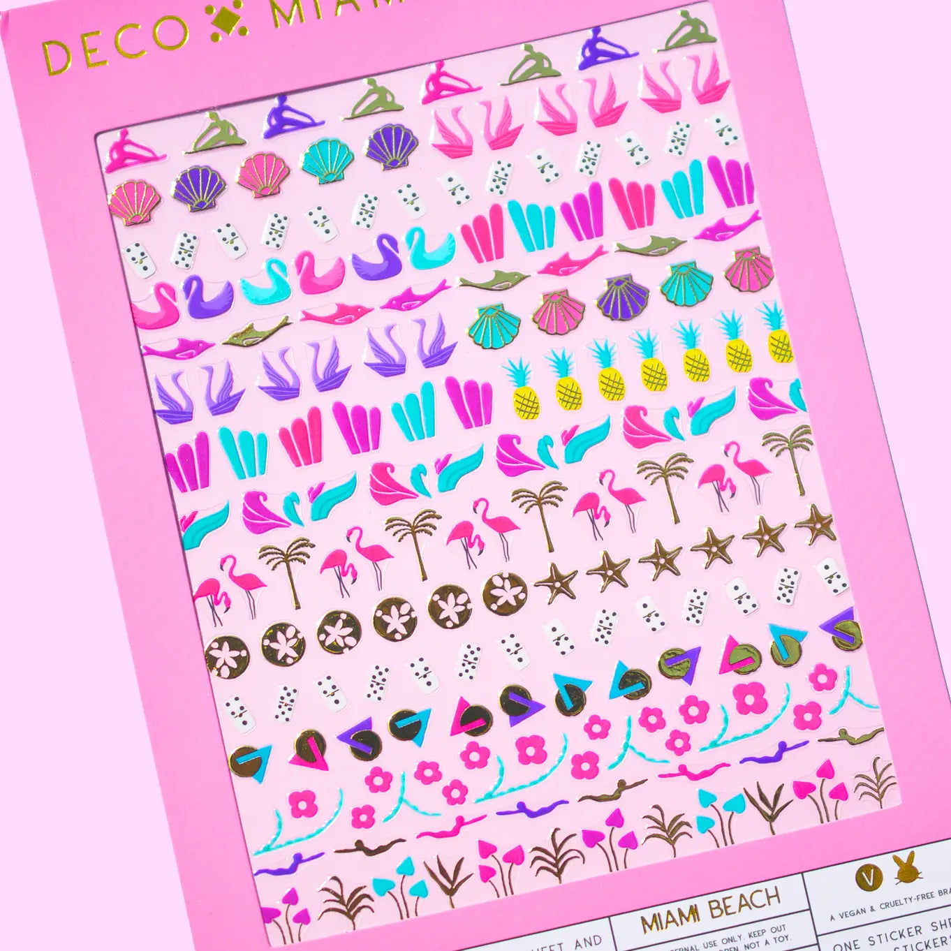Pink, purple, gold and teal themed nail stickers inspired by Miami on pink background.