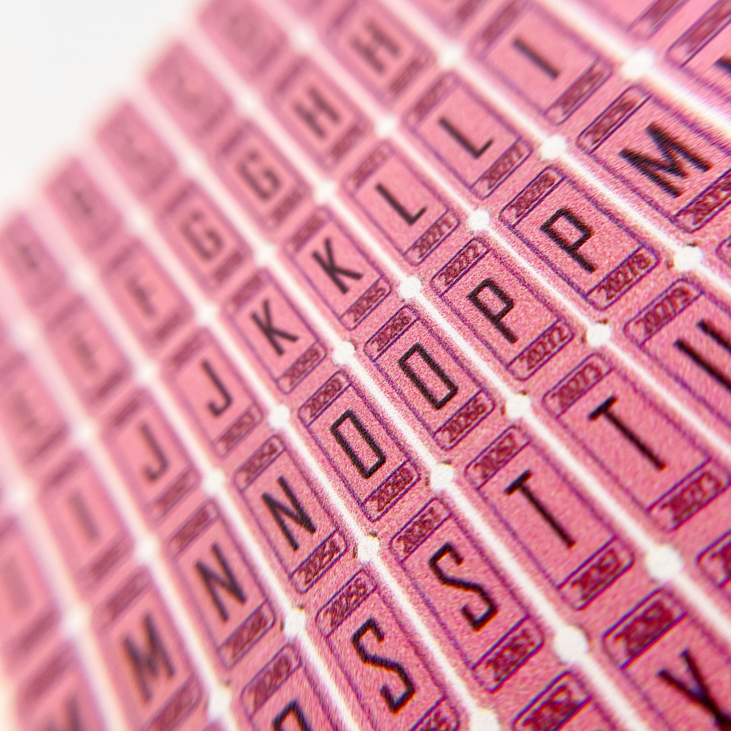 Raffle Ticket Nail Stickers - Pink Alphabet Nail Stickers Resembling Raffle Tickets, Displayed on a White Background.