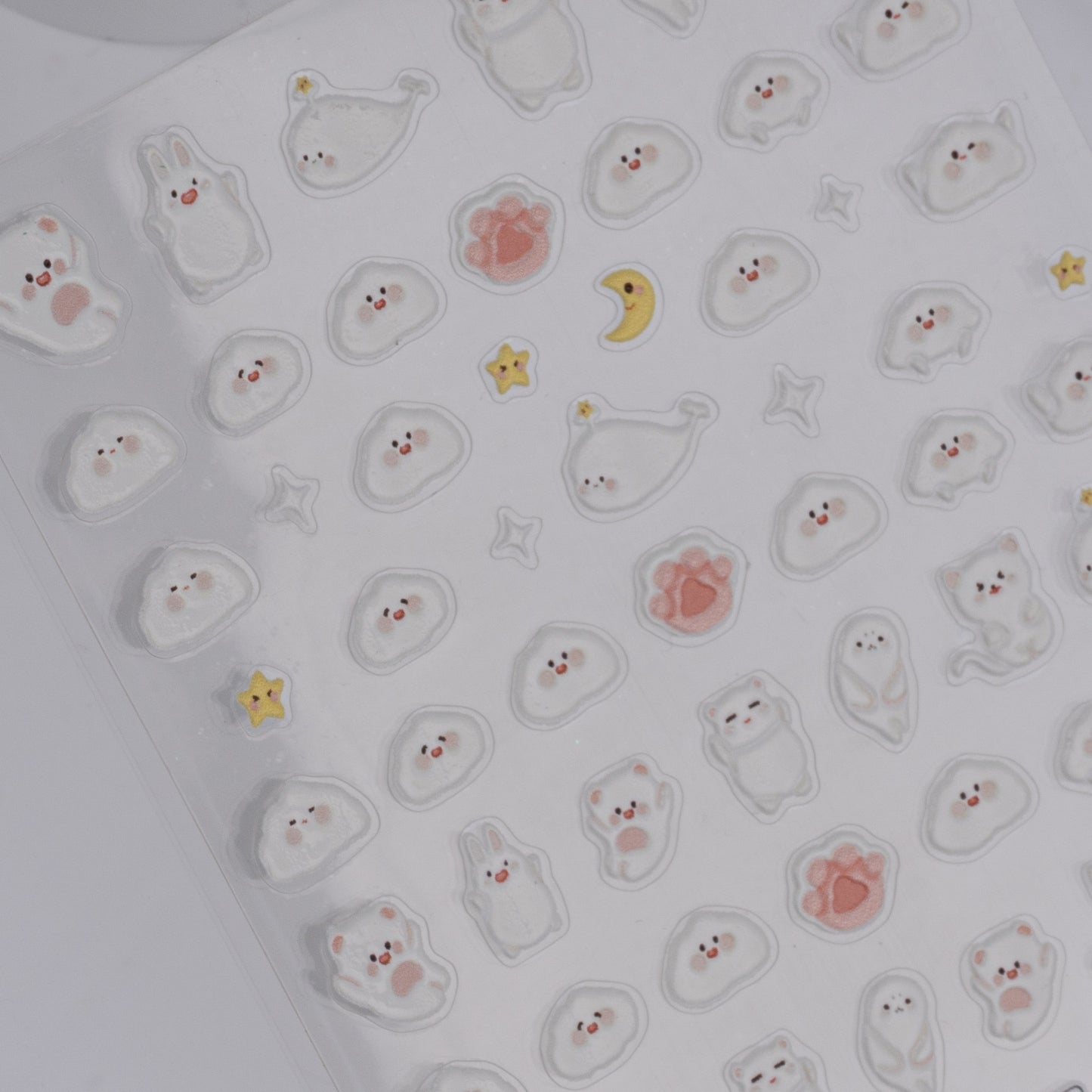 Sheet of small, cute animal stickers on a white background