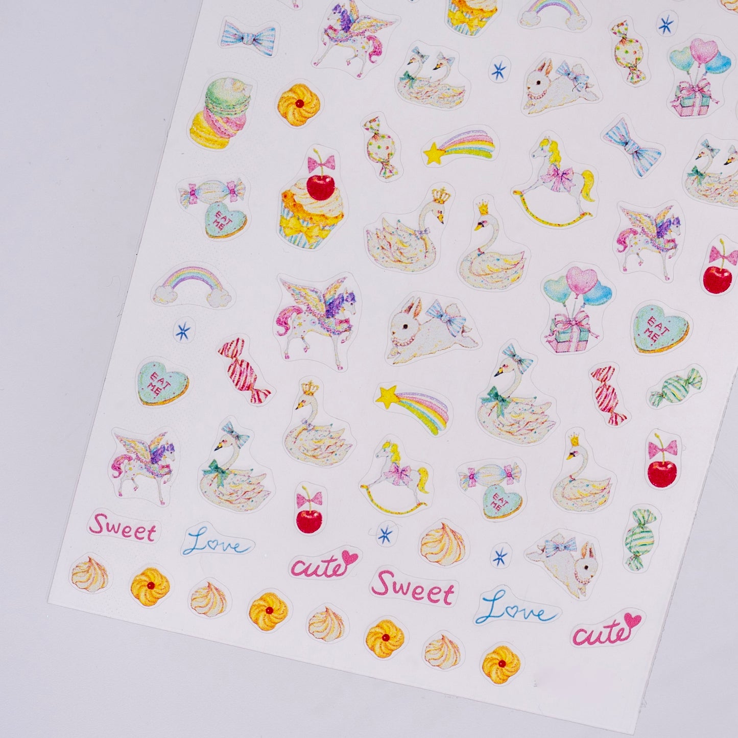 Sheet of colorful stickers with various designs on a white background