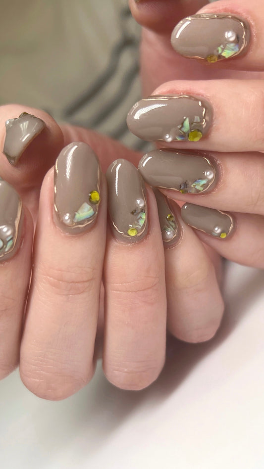 Nail art example on hands.