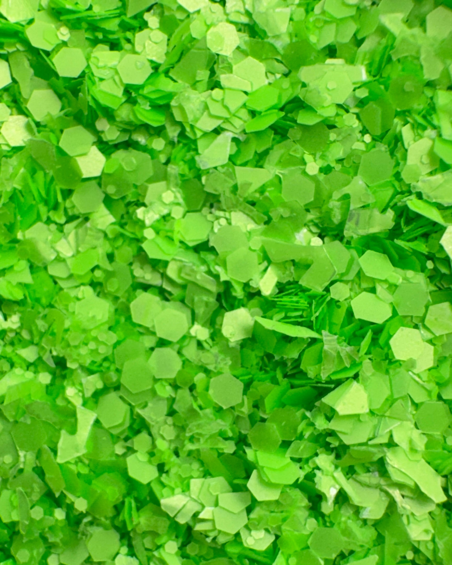 Green glitter with a textured surface