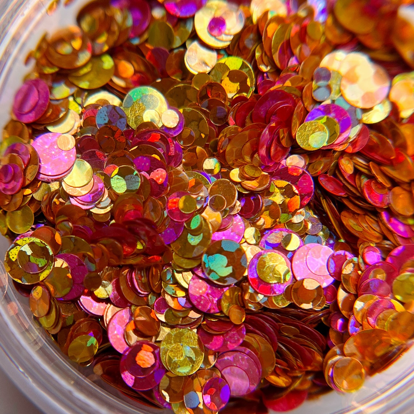Tequila Sunrise glitter mix in jar. 