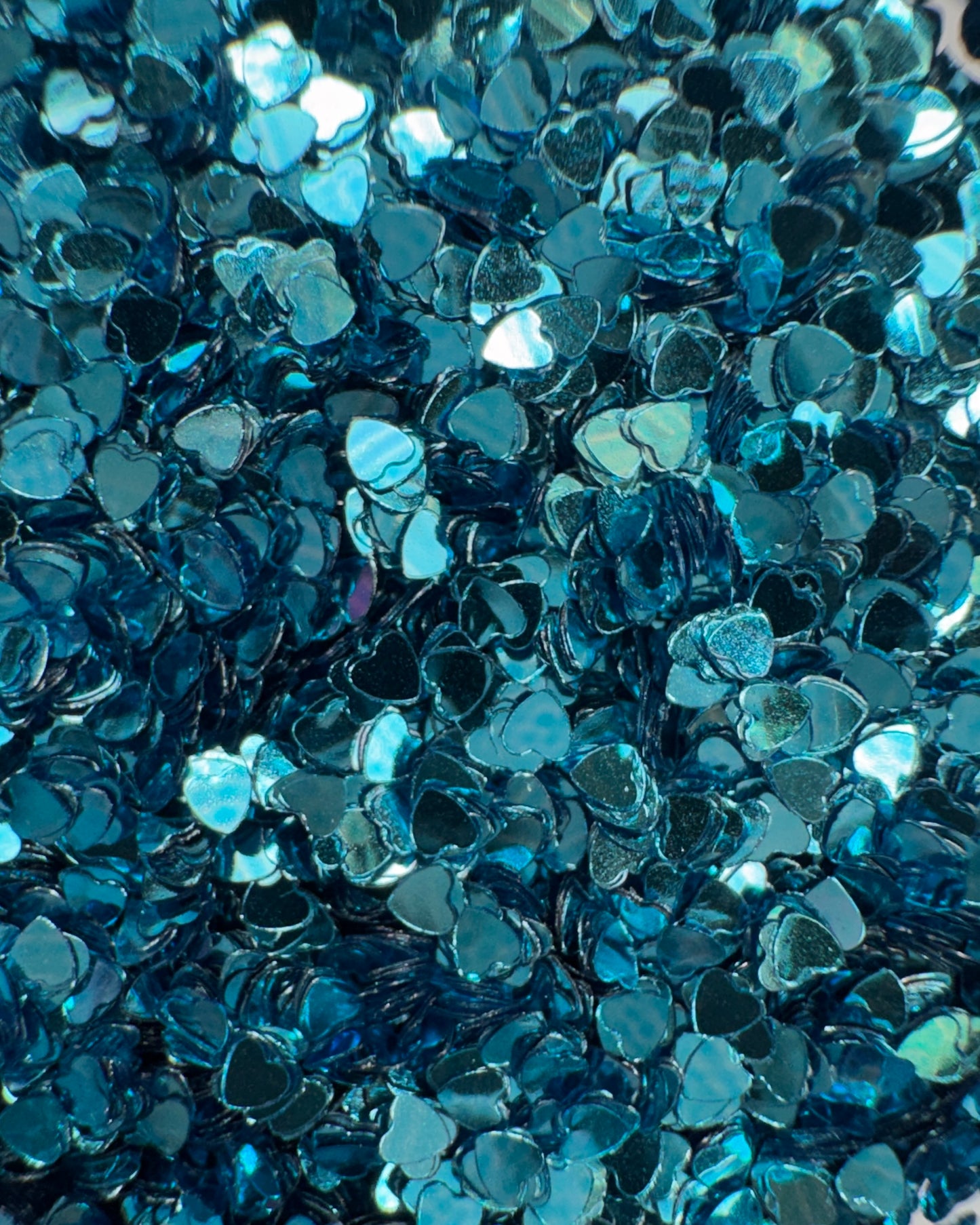 Blue heart-shaped glitter pieces