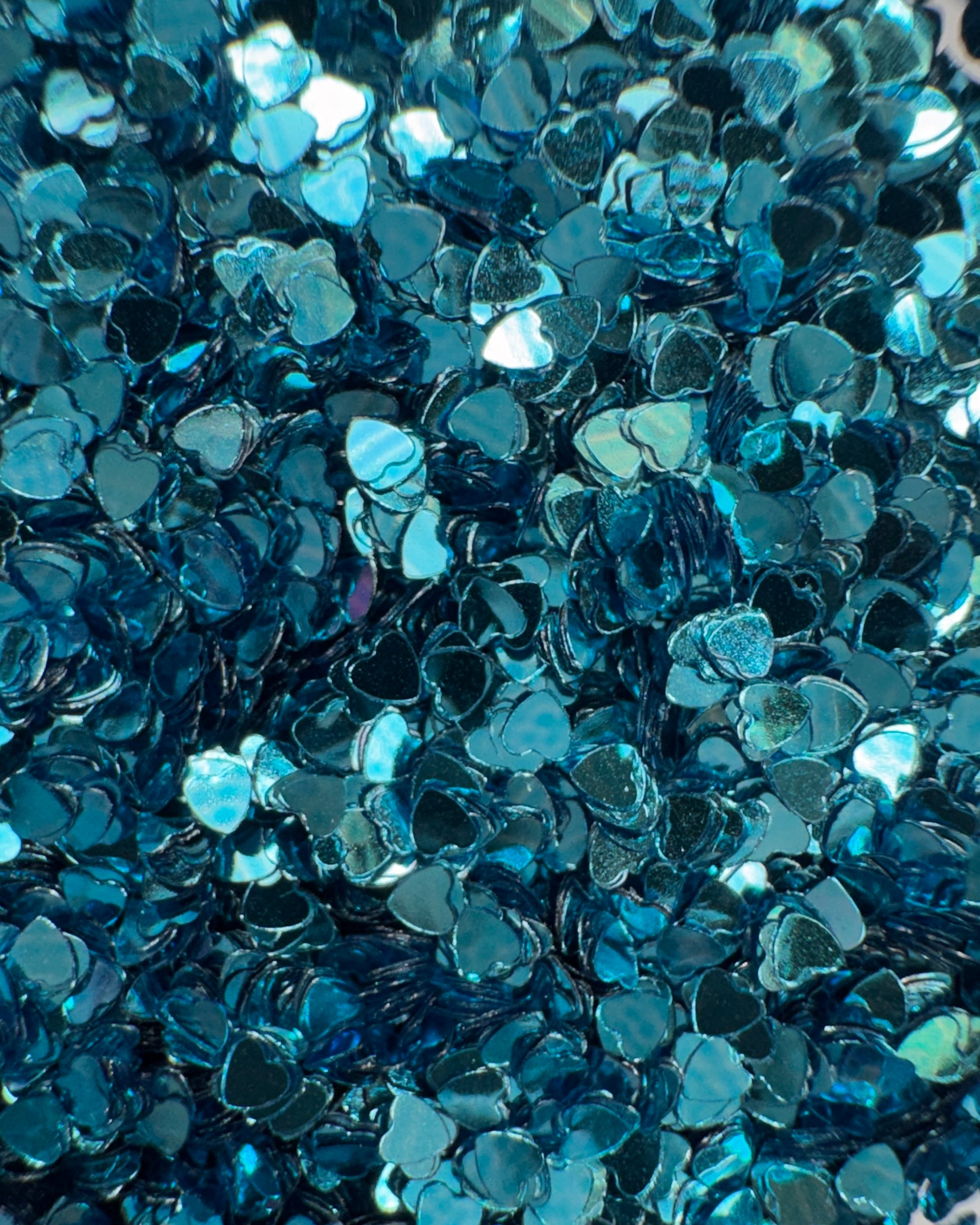 Blue heart-shaped glitter pieces