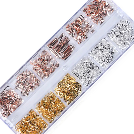 12 grid gold, rose gold and silver charm set on white background. 