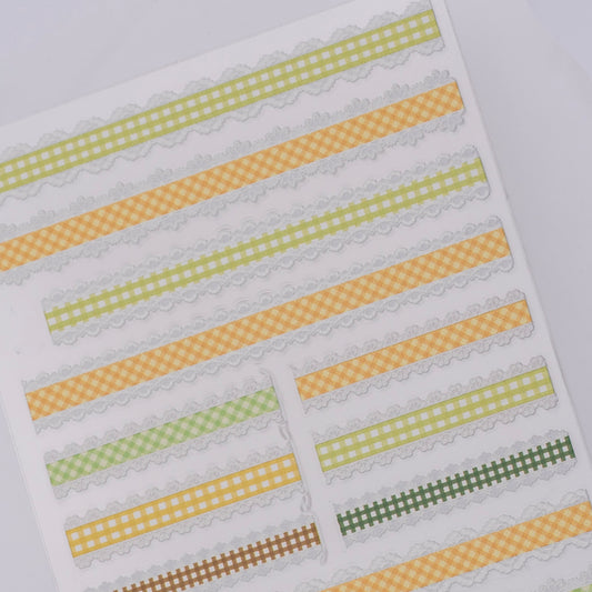 Checker design nail stickers on white background.