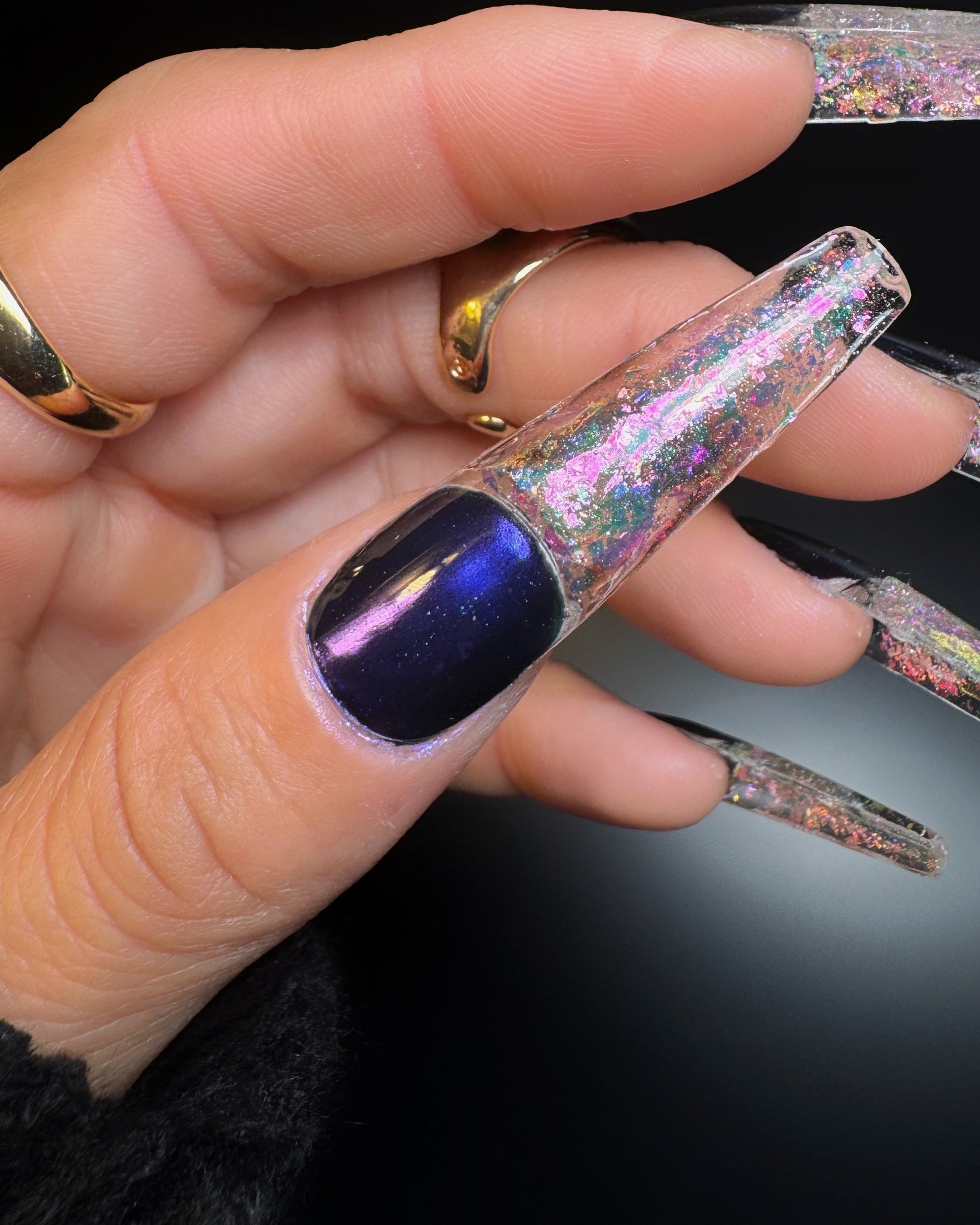 Hand with glittery long square nails