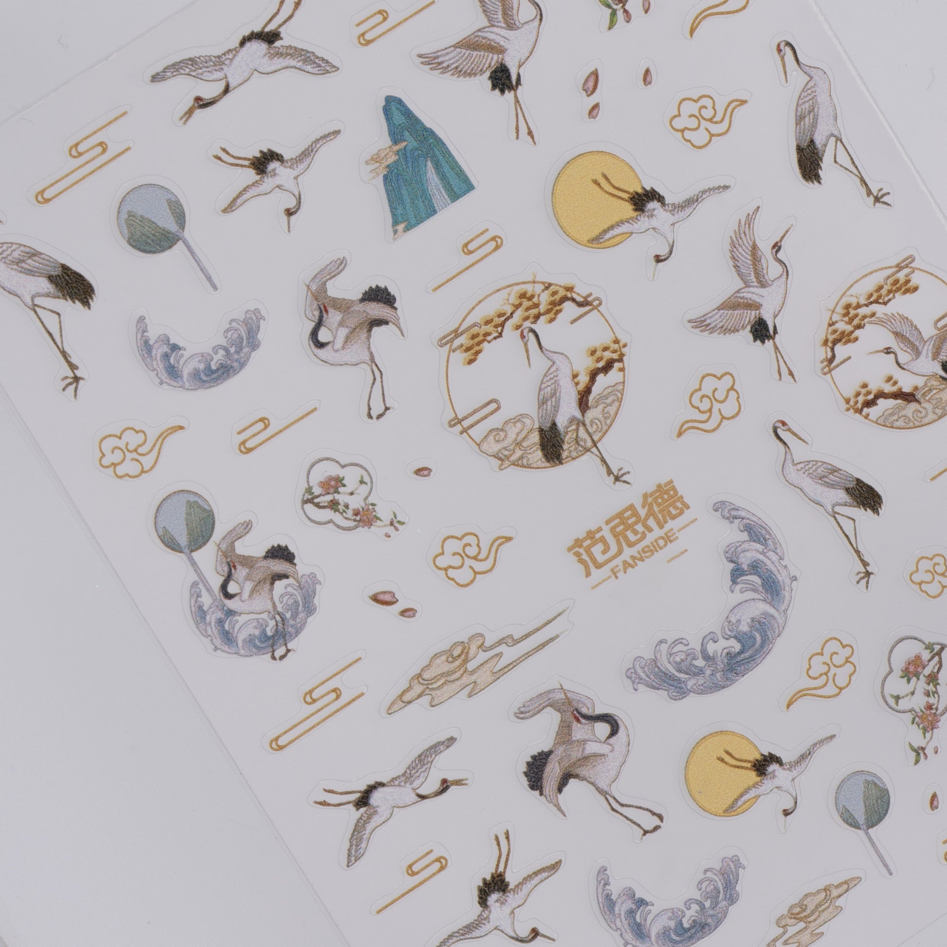 Sheet of decorative stickers with crane designs and Chinese characters on a white background