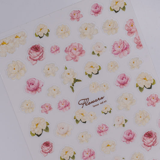 Sheet of floral stickers with pink and white flowers on a white background
