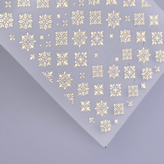 Detail view of nail decal sheet on light background.