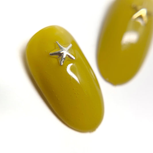 Decorated nail tips on white background. 