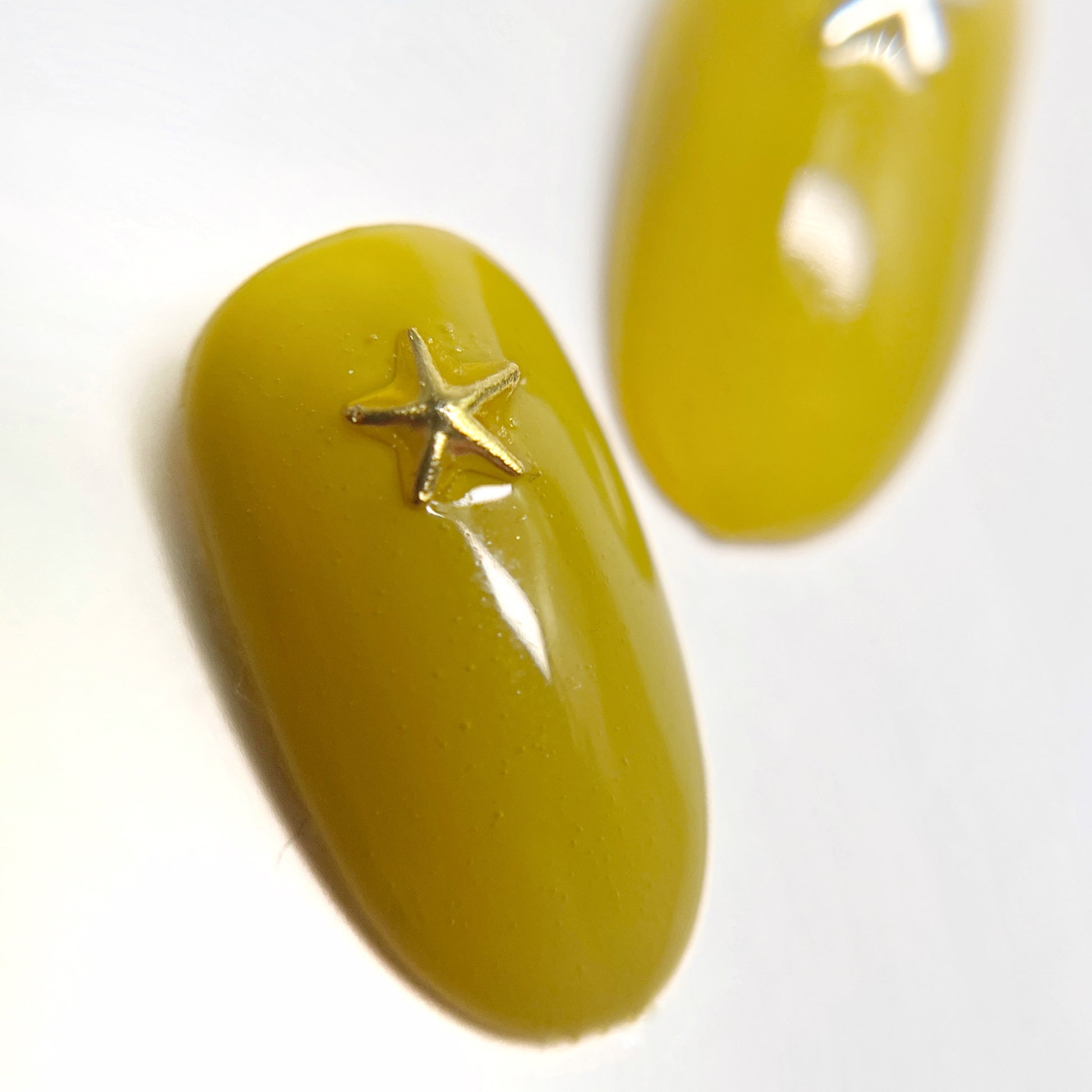 Decorated nail tips on white background. 