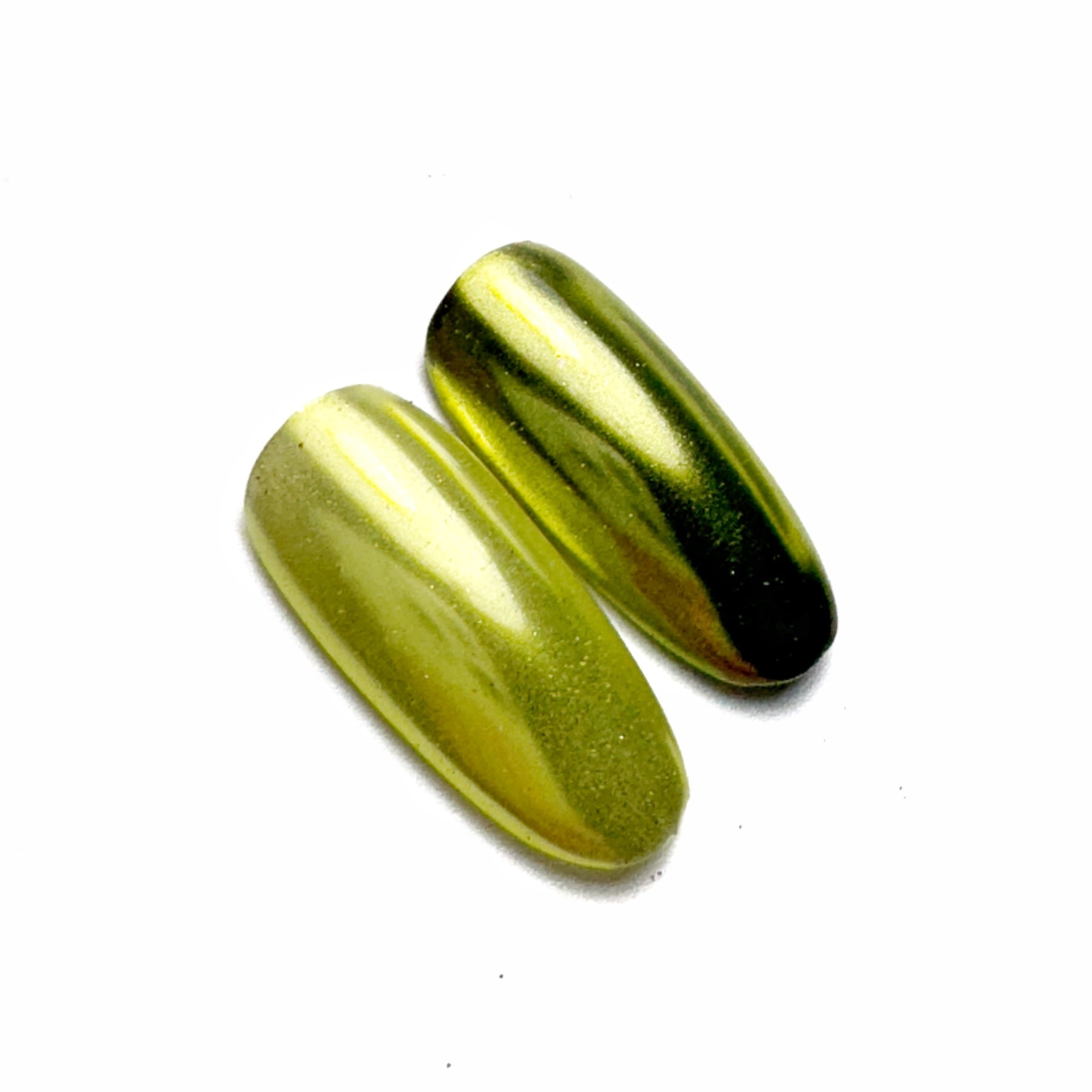 Nail tips with iridescent finish on white surface,