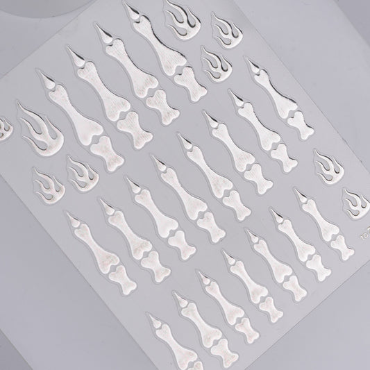 Sheet of bone and flame designs on a gray background