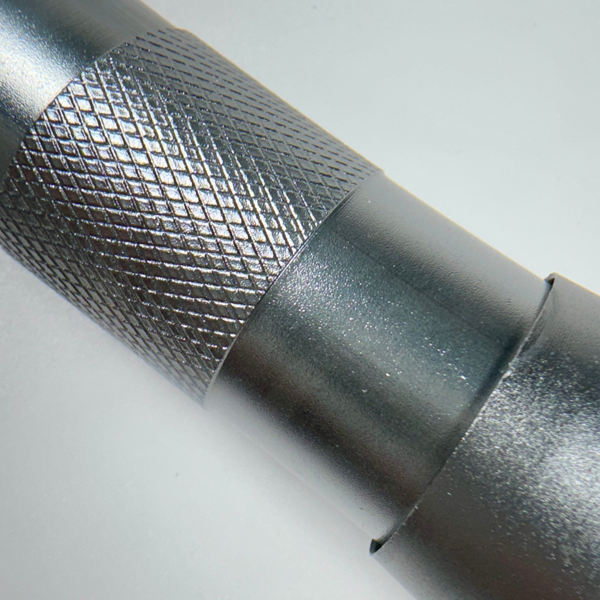Side view close up of flash cure light on light background 