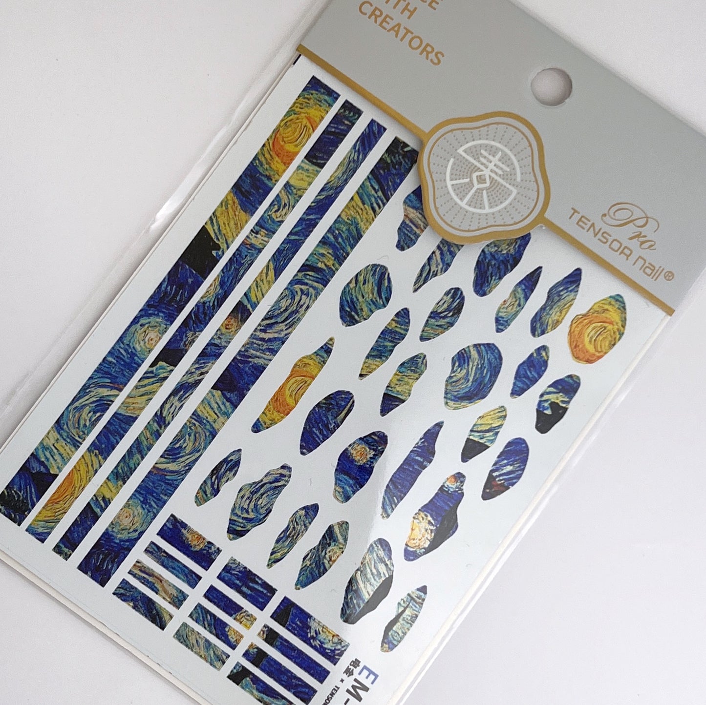 Nail art decal sheet with abstract design on a white background