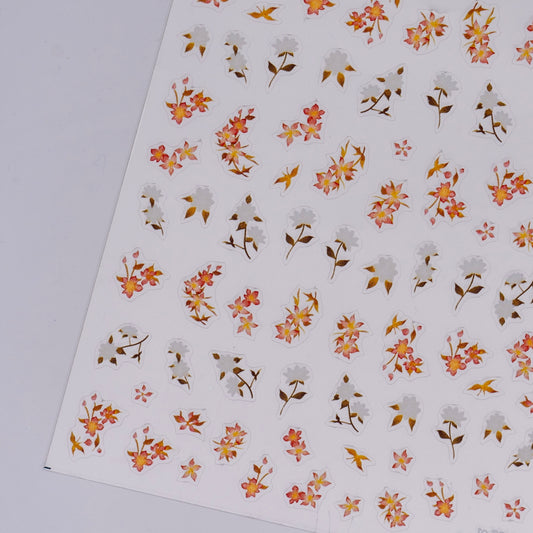 Sheet of floral stickers with small flowers on a white background