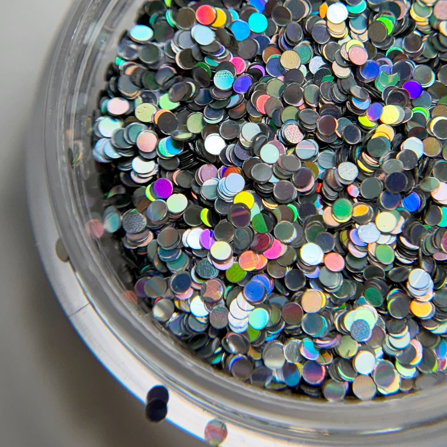Close up of glitter in clear container.
