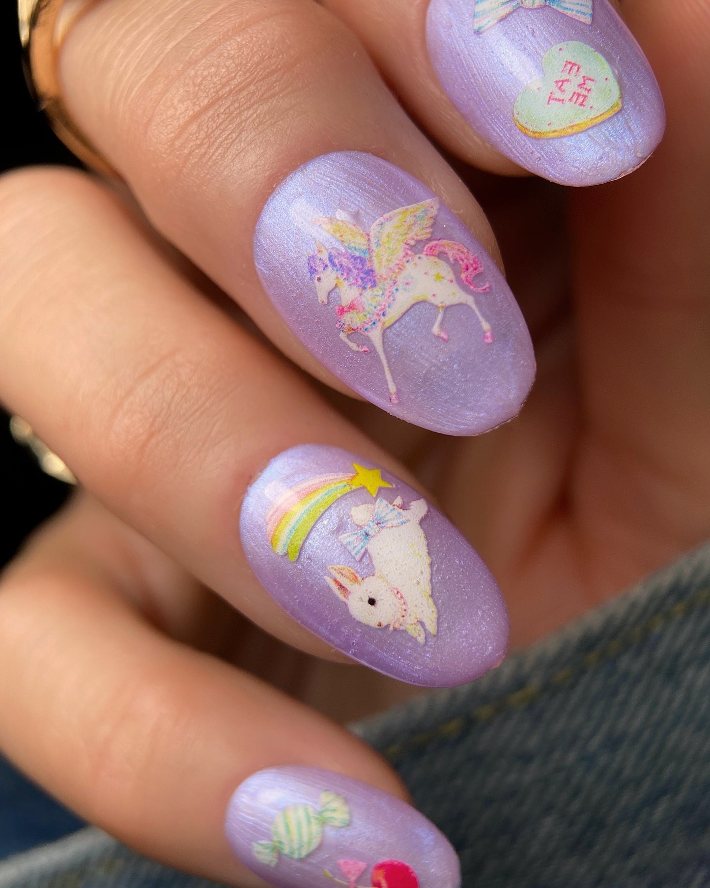Manicured hand with nail art.