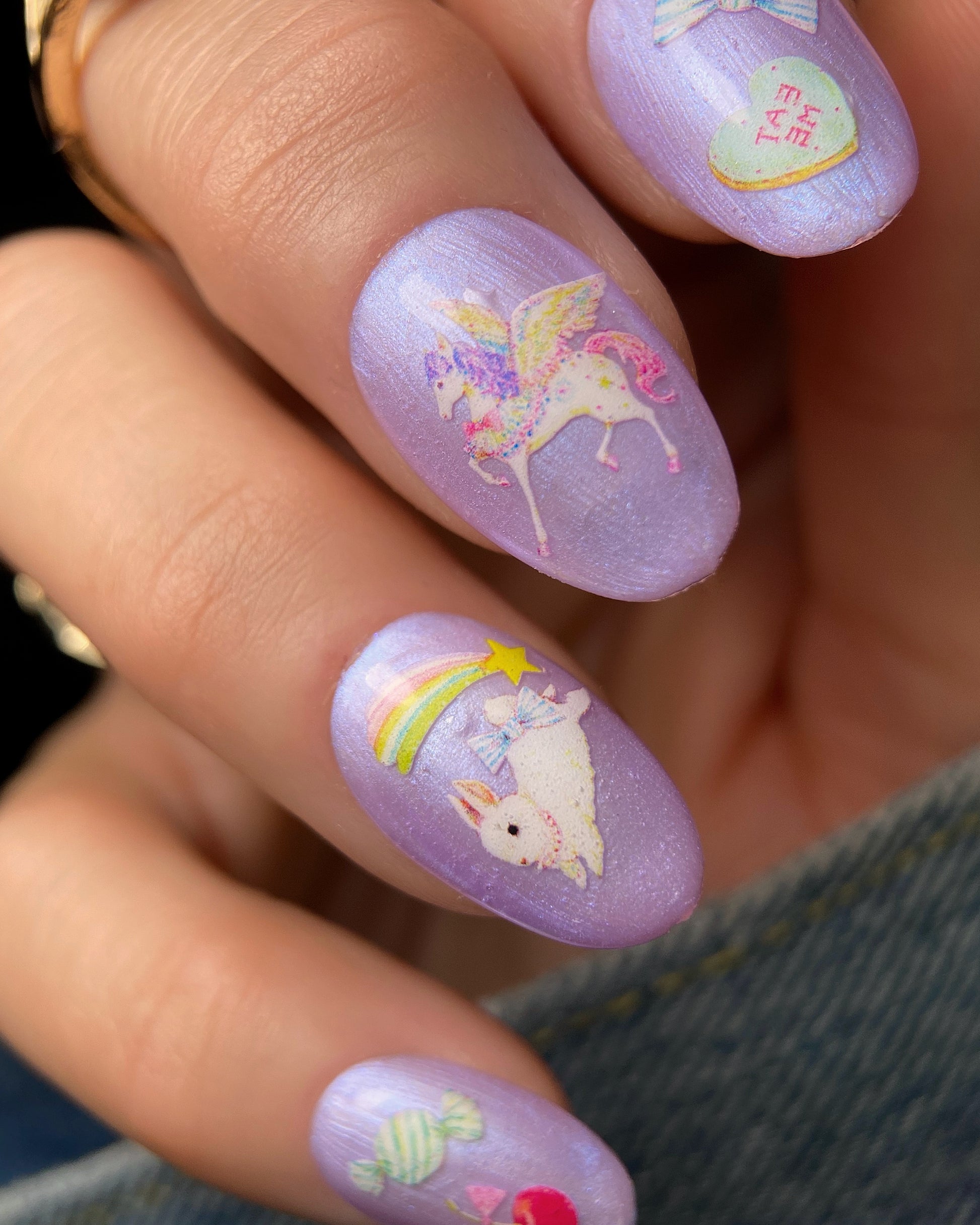 Manicured hand with nail art.