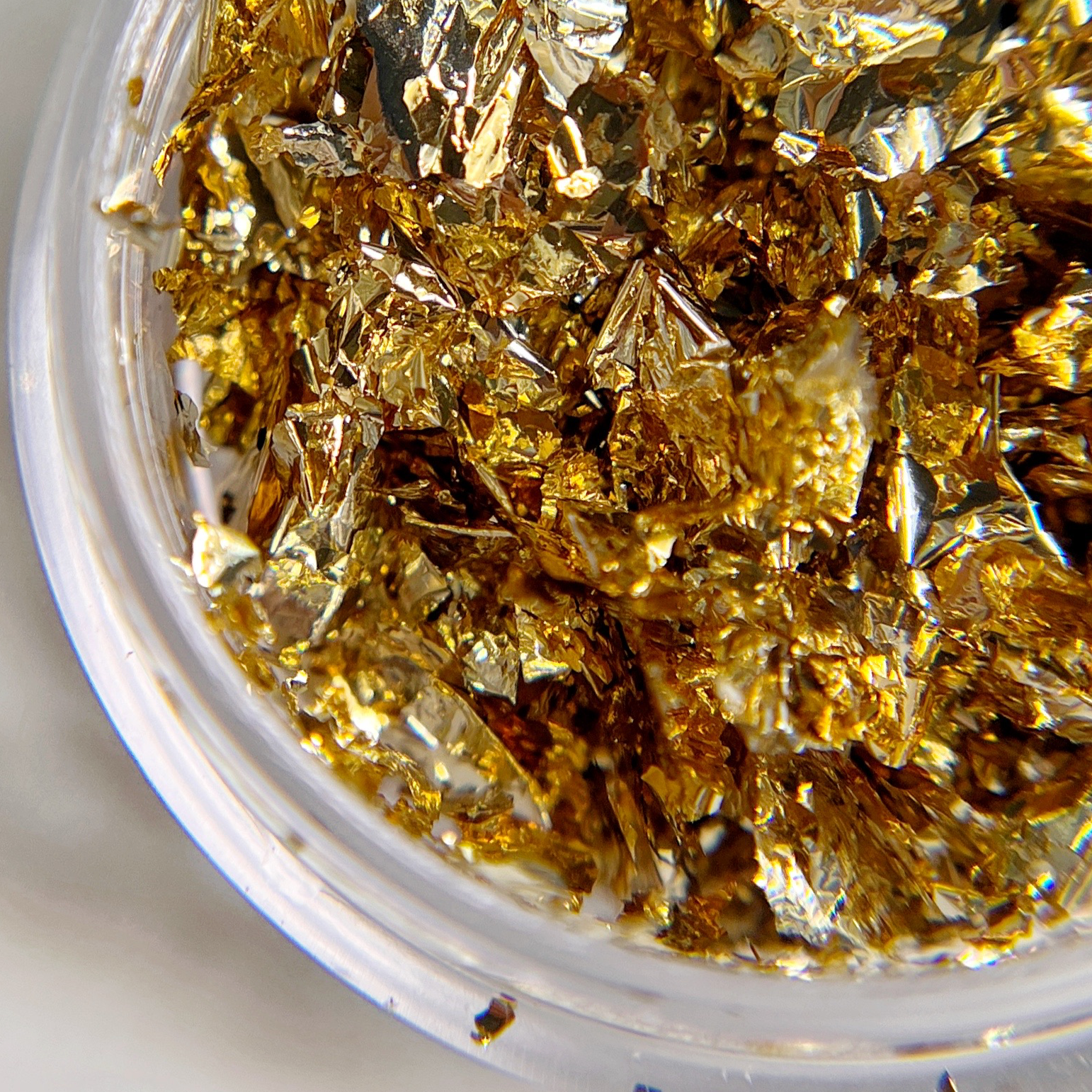 Cool and warm gold combination foil flakes for nail art. 