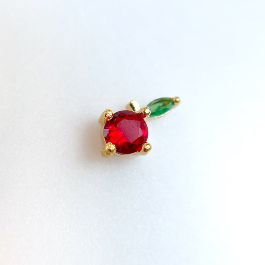 Rhinestone nail charm on white background.